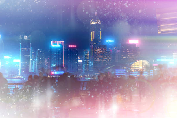 istock Abstract colorful bokeh with city night background. Double exposure 1150855309