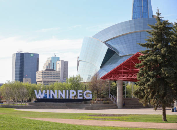 Winnipeg, Manitoba / Canada - May 21, 2019: View of the Canadian Museum for Human Rights and Winnipeg Cityscape.