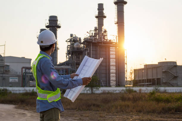 istock engineer discussing a new project with large industry background 1150858273
