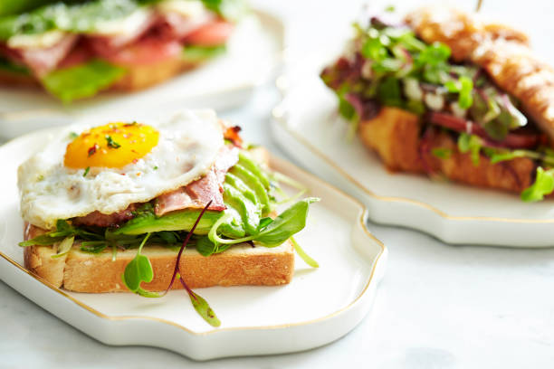 istock Croissant sandwich and egg bacon toast 1150860912