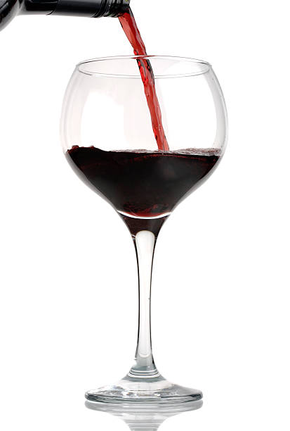 istock Pouring red wine into glass 115086109