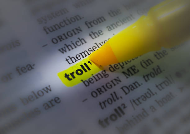 istock A page of the dictionary with the highlighted word: troll 1150862281