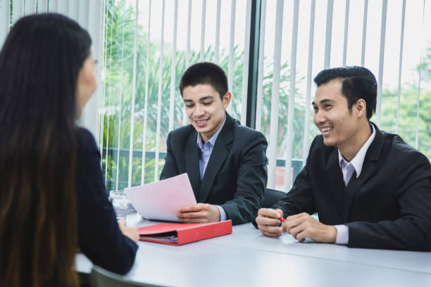 istock asian businesswoman candidate present her profile application on job interview 1150865072