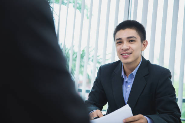 istock businessman ask candidate for answers explaining about his profile, job interview concept 1150865081