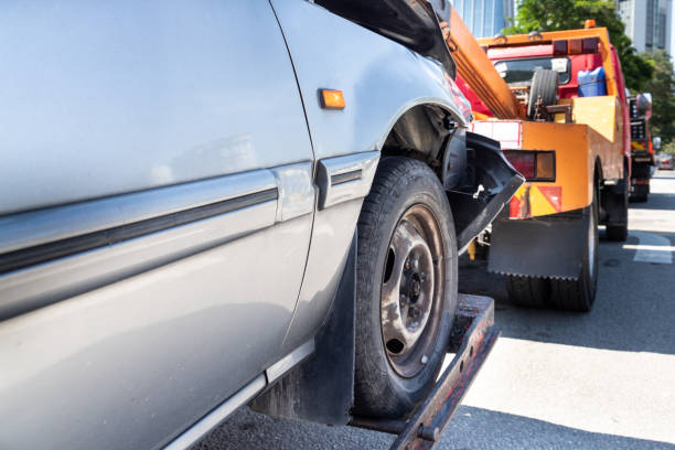 istock Tow truck towing a broken down car in emergency 1150865258