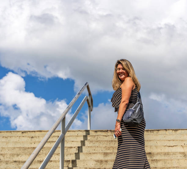 istock Brazilian woman on steps 1150865989