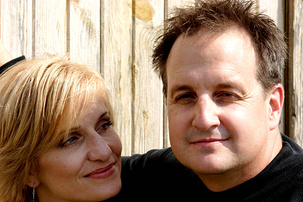 istock middle aged couple portrait 115086930