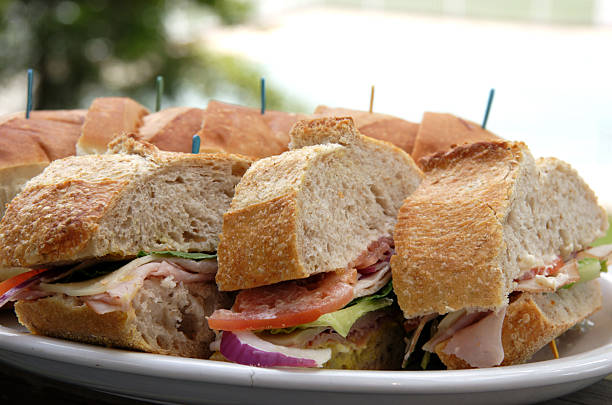 turkey and ham sandwiches on organic wheat bread