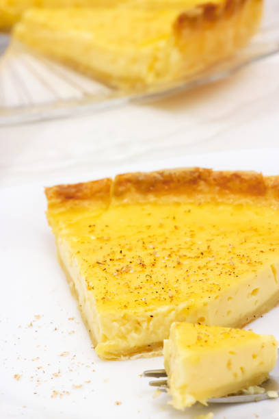 istock Sweet custard tart or lemon pie white background. Selective focus. Close up. 1150870214