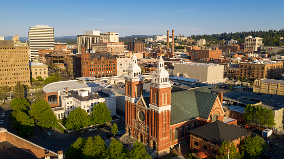 Rich late afternoon light falls onto the buildings and architecture of Spokane Washington USA