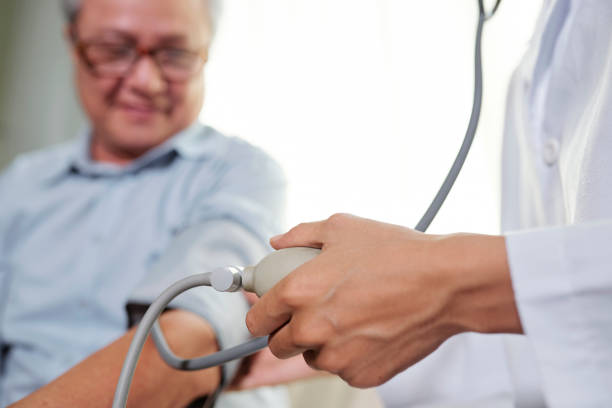 istock Doctor taking pulse of the patient 1150871751
