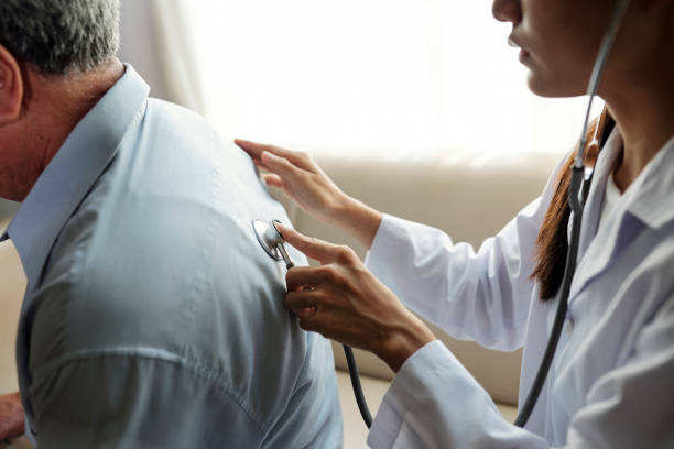 istock Doctor examining the patient with stethoscope 1150871757