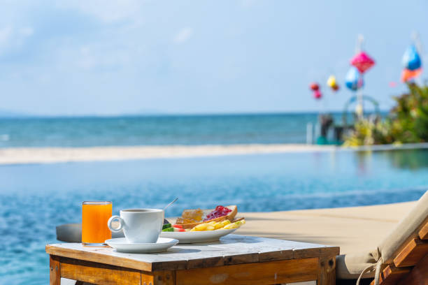 istock Breakfast at swimming pool in the resort 1150872488