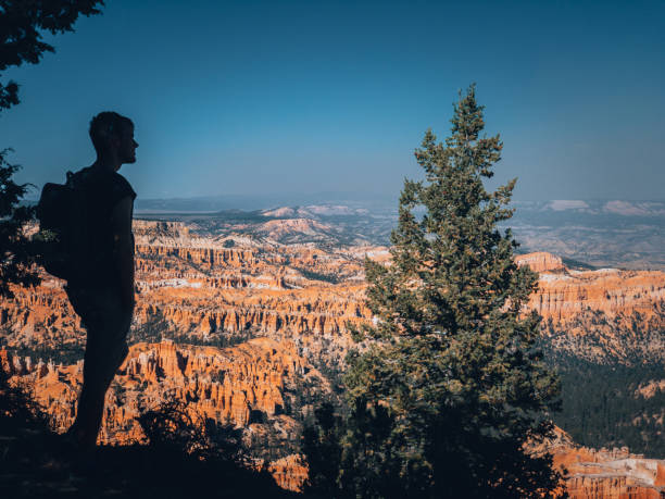 istock Hiker relaxes over Bryce Canyon 1150874187