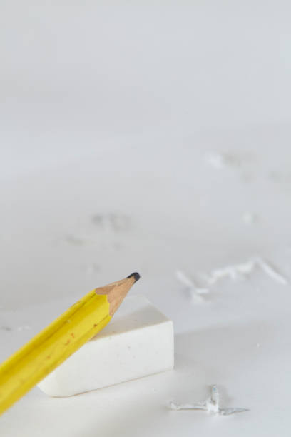istock Yellow pencil White eraser and eraser leftovers white background 1150875255