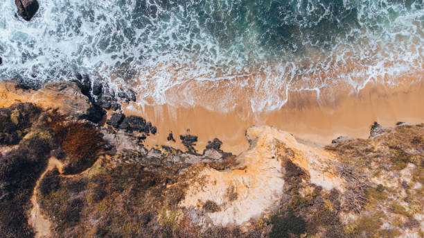 istock Aerial view down to coastline 1150875439