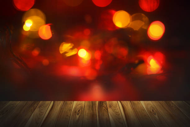 istock Abstract bokeh and blur light on wooden background 1150875501