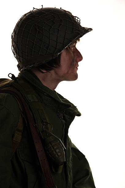 teen boy dressed in WWII army gear