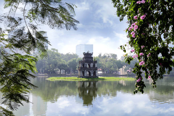 The Turtle Tower (Thap Rua) on Hoan Kiem Lake (Sword Lake) Hanoi, Vietnam The Turtle Tower (Thap Rua) on Hoan Kiem Lake (Sword Lake) Hanoi, Vietnam ho guom stock pictures, royalty-free photos & images