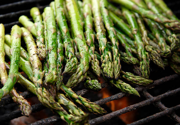 food bbq grilled asparagus fresh Asparagus bunch on grill asparagus photos stock pictures, royalty-free photos & images