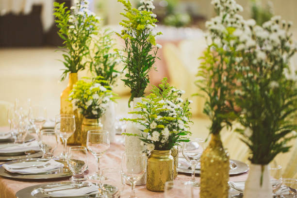 istock Table decorated for wedding event. Colors golden and white 1150882647
