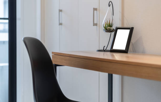 istock Empty picture frame placed on the desk in the bedroom 1150883046