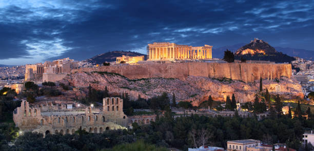 istock Acropolis hill - Parthenon temple in Athens at night, Greece 1150883163