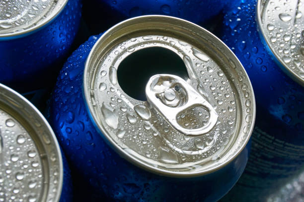 istock Close up of blue soda cans with open pull tab 1150884125