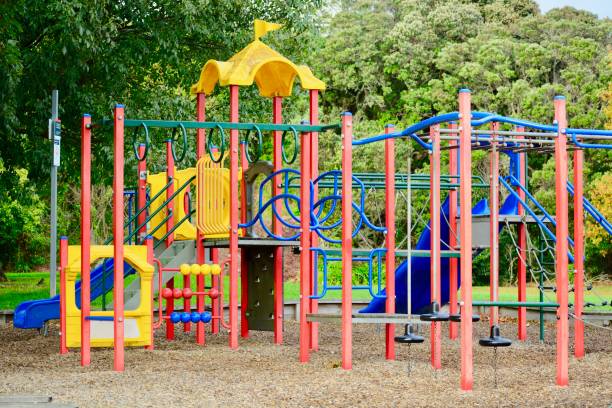 istock A colourful playground, inviting kids to play there. Combination playground structure for small children including slides, climbers, playhouse 1150888277