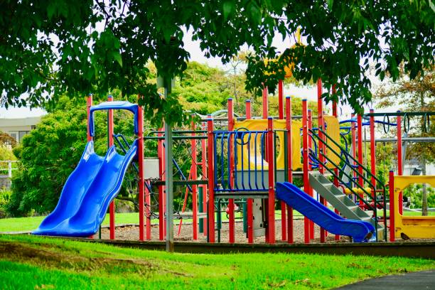 istock A colourful playground, inviting kids to play there. Combination playground structure for small children including slides, climbers, playhouse 1150888584