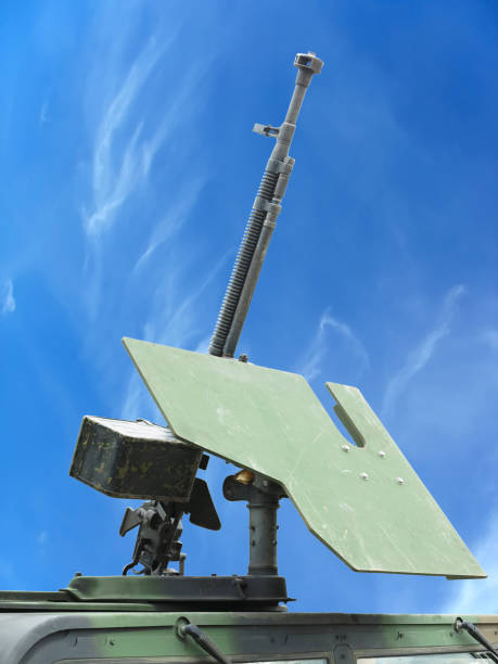 Russian old green anti-aircraft machine gun  over blue sky background