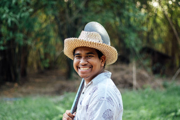 istock Farmer working with his shovel 1150888623