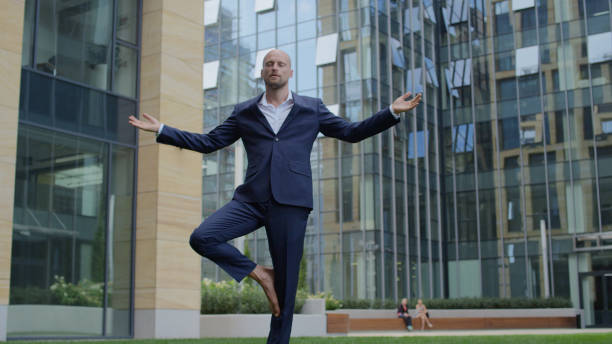 istock Business yoga during lunch break 1150889576
