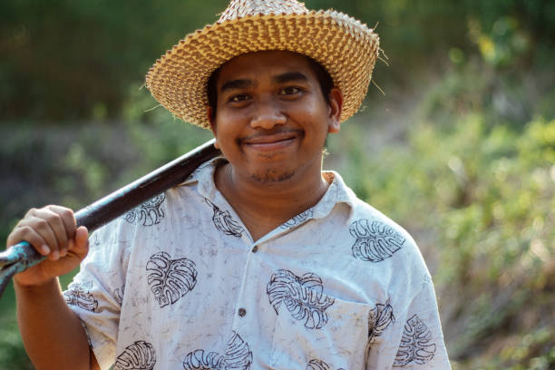 istock Farmer working with his shovel 1150889698