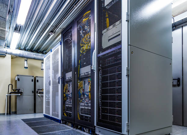 istock Room with server rack of hardware, cloud storage in big data center 1150892587