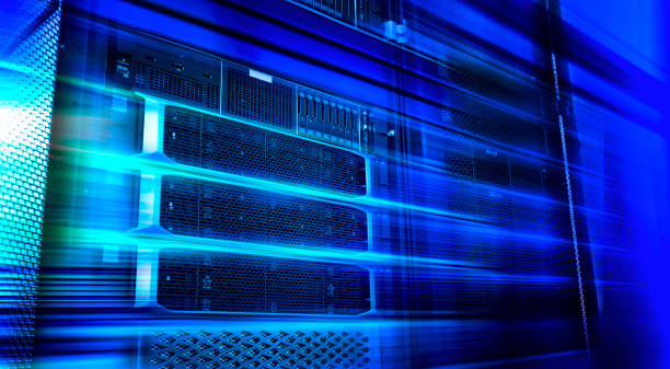 istock Blade server equipment rack in big data center neon cold blue tone in motion 1150892749