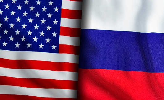 American and Russian flags standing side by side