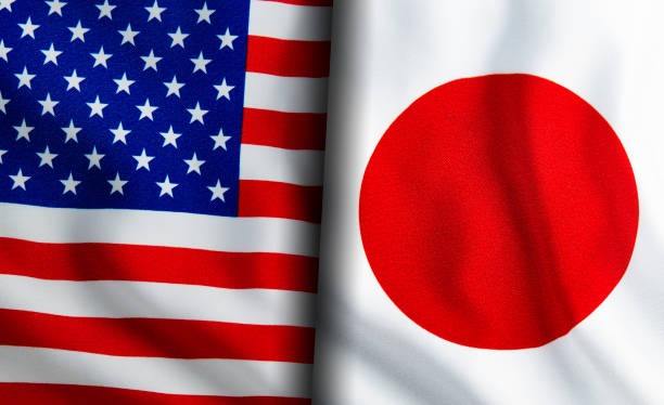 istock American and Japanese flags standing side by side 1150892900