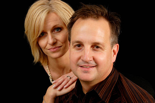 istock man and woman portrait 115089302