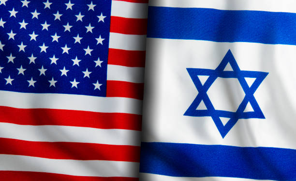 istock American and Israeli flags standing side by side 1150893750