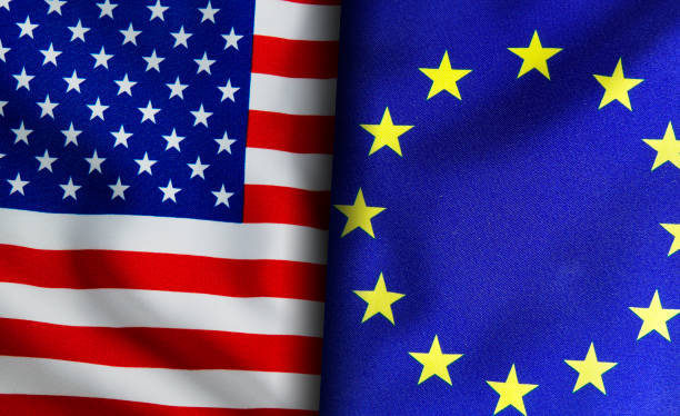 istock American and European union flags standing side by side 1150894293