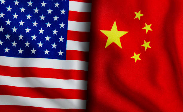 istock American and Chinese flags standing side by side 1150895262