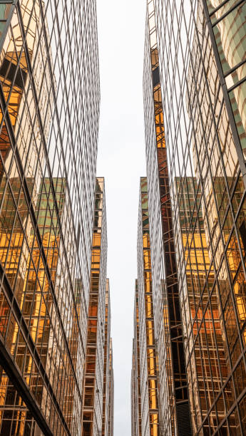 istock Bright future, finance buildings reflecting in each other, seen from below 1150897977