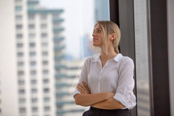 istock Businesswoman Looking Away In Office 1150898121