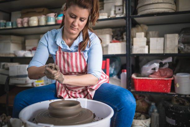 istock Pottery female artist 1150899132