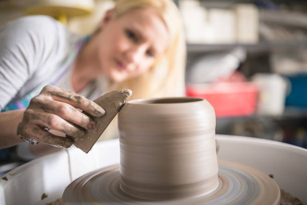 istock Pottery female artist 1150899547