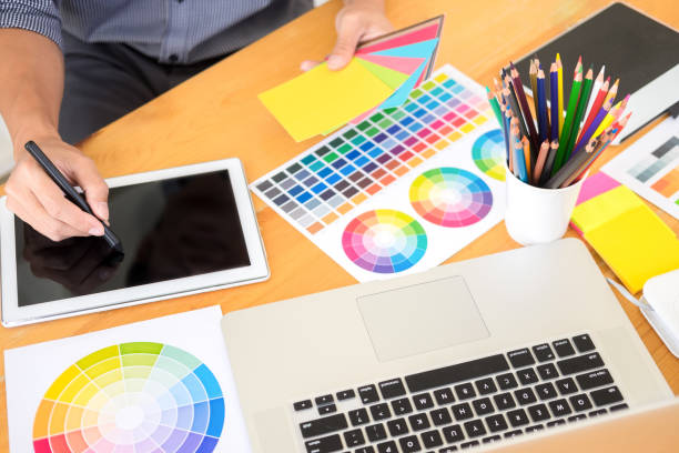 istock Midsection Of Businessman Using Digital Tablet On Desk 1150899653