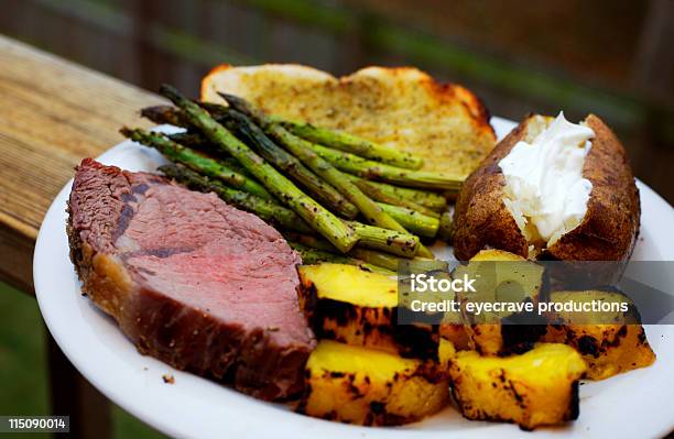 Roast Beef Prime Rib Asparagus Baked Potato Platter Stock Photo - Download Image Now