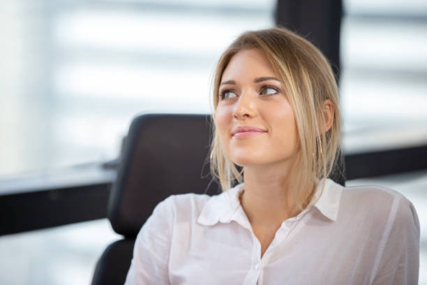 istock Businesswoman Looking Away In Office 1150907657