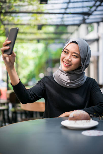 istock Malaysian girls taking a selfie 1150908495